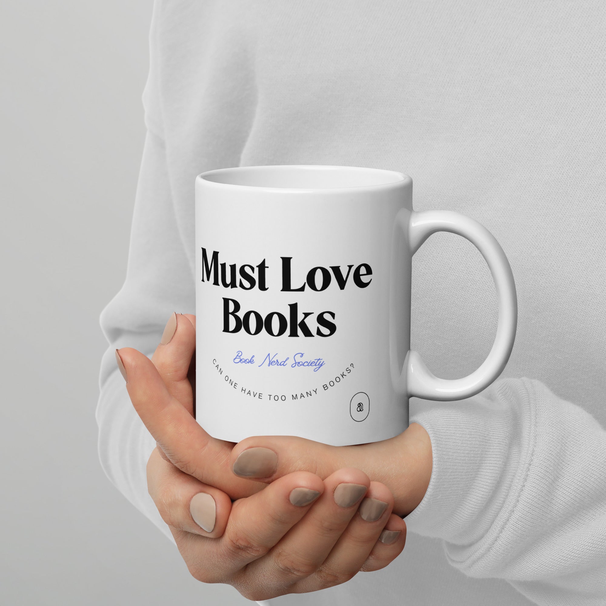 http://www.authenticbooks.com/cdn/shop/products/white-glossy-mug-white-11oz-handle-on-right-640f931b90e39.jpg?v=1680788939