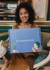 Natisha holding Authentic Books box